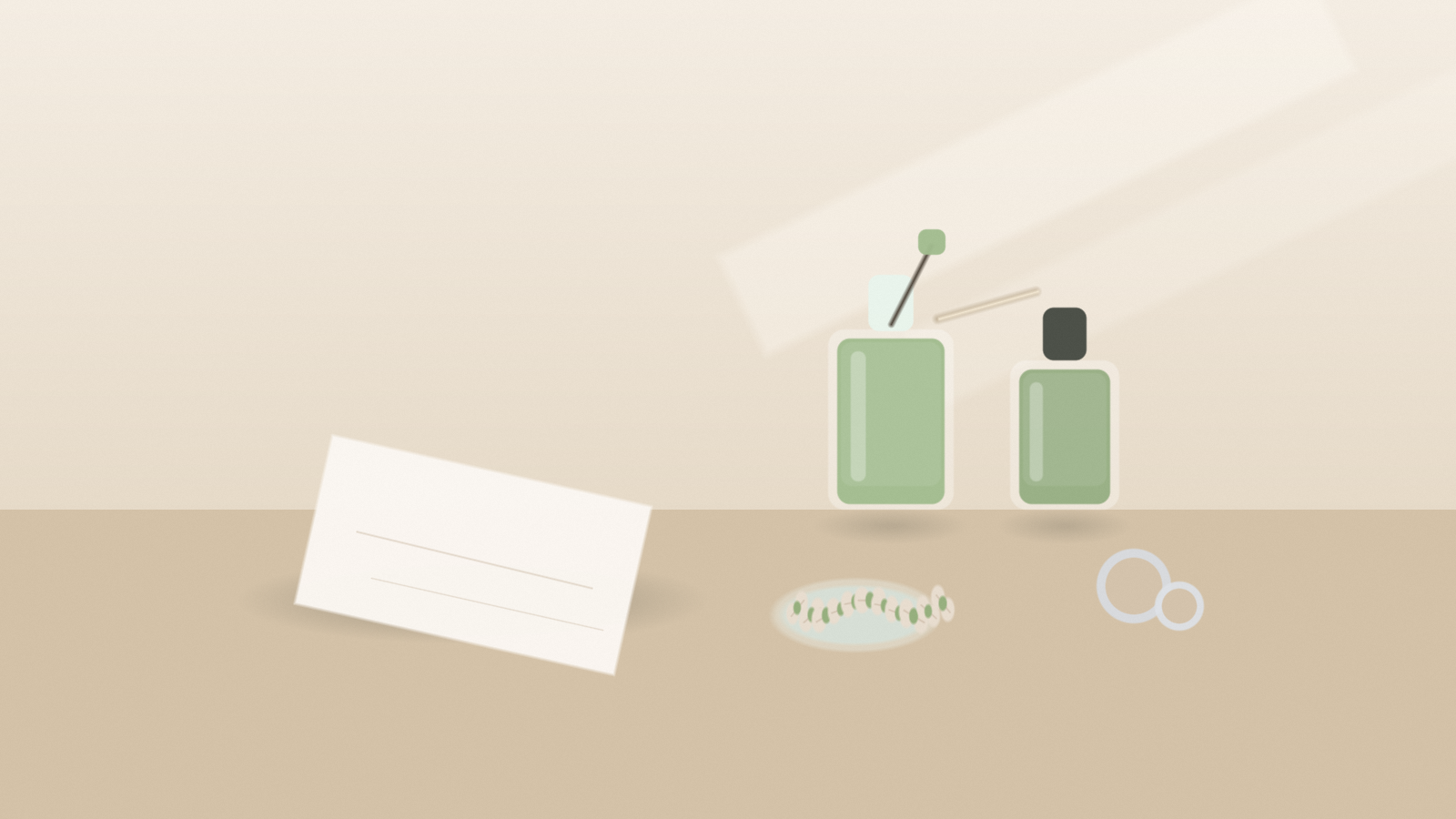 A soft editorial still life with two pistachio-green nail polish bottles, a brush, silver rings, a white linen swatch, and a small glass dish of pistachios on a warm beige tabletop.