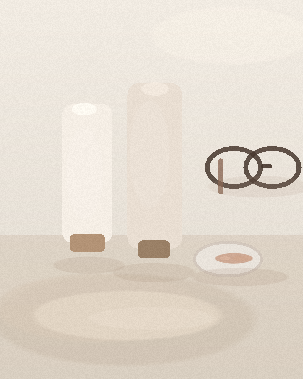 A quiet still life with two sunscreen tubes, round sunglasses, and a small dish holding a tinted sunscreen smear.