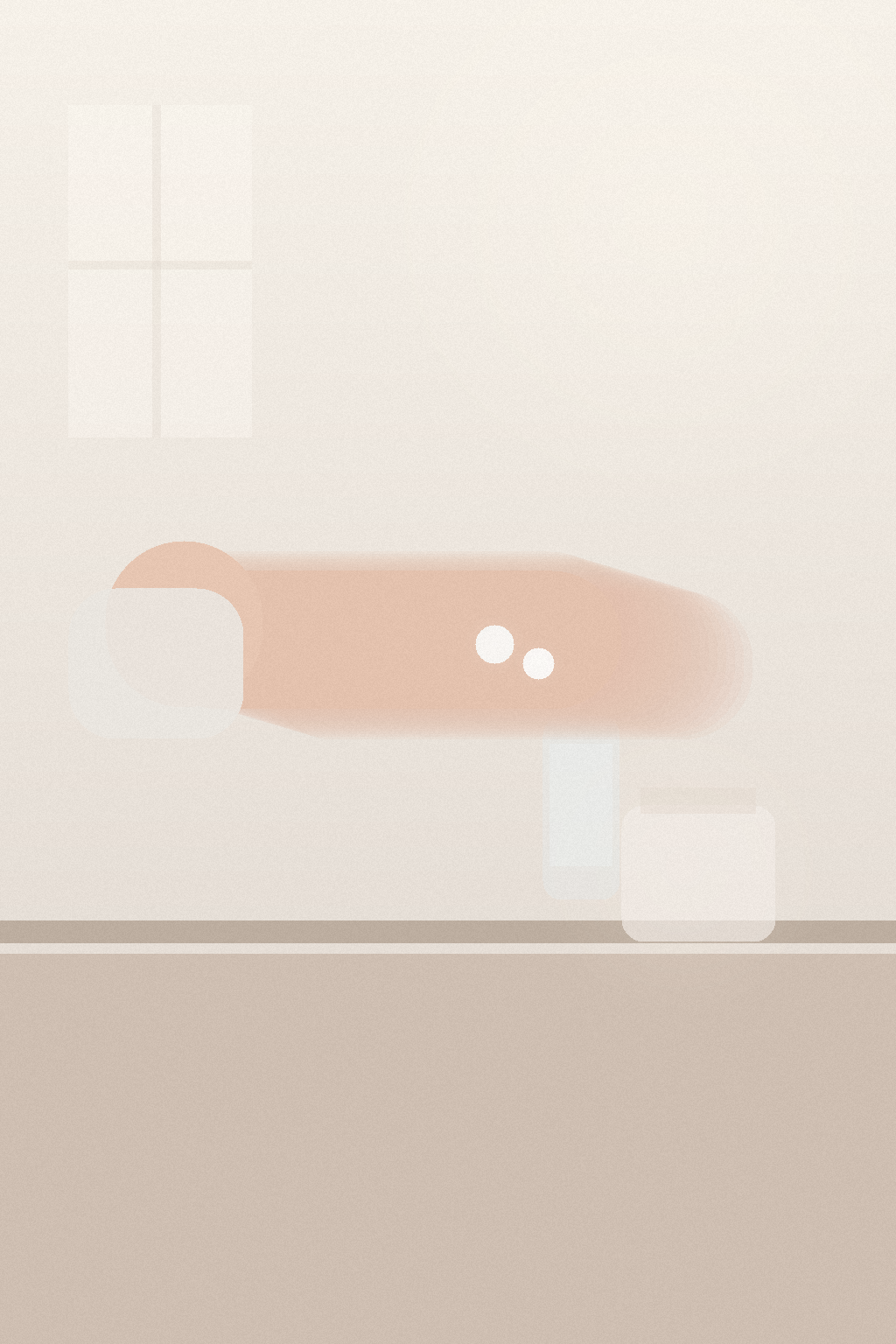 A close view of a forearm with two small dabs of cream near the wrist on a pale vanity in soft morning light.