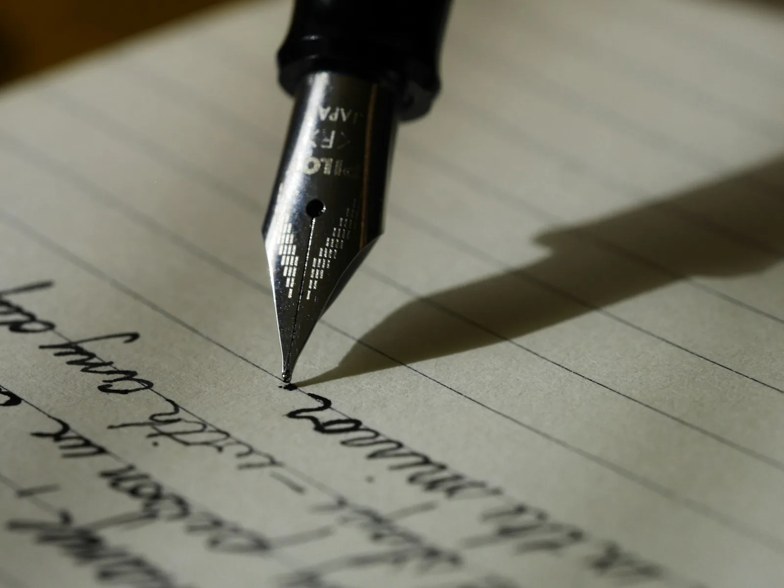 Notebook and pen on a desk